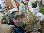 Ente aus Bronze mit Wasserspeier
